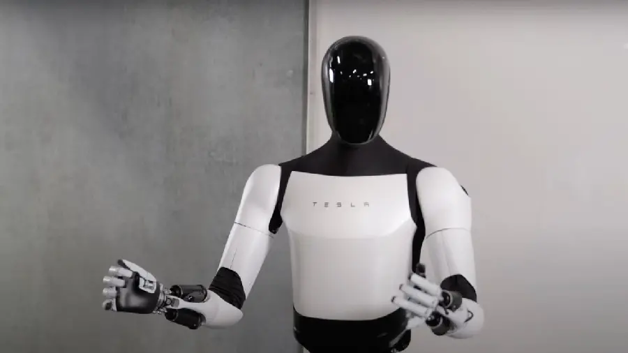 Photo of Optimus Tesla robot with a simple background suitable for advertising robotics classes 