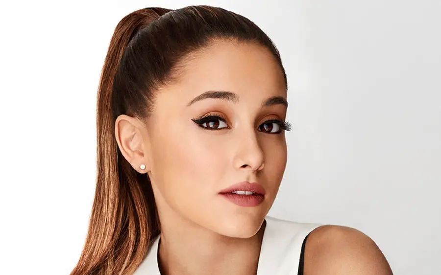 Adorable stock photo of Ariana Grande on a white background