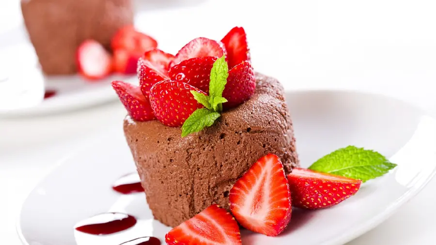 Wallpaper of a mini cake with a fresh and sweet strawberry design