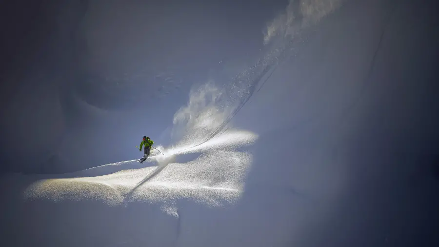 Scenic photo of skiing on snow suitable for computer desktop background 