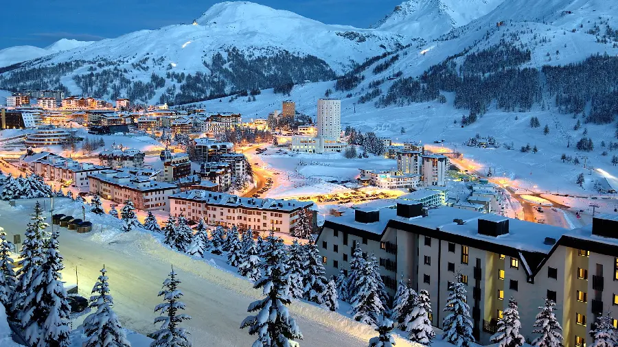 High-quality wallpaper of a snowy city in a mountainous climate