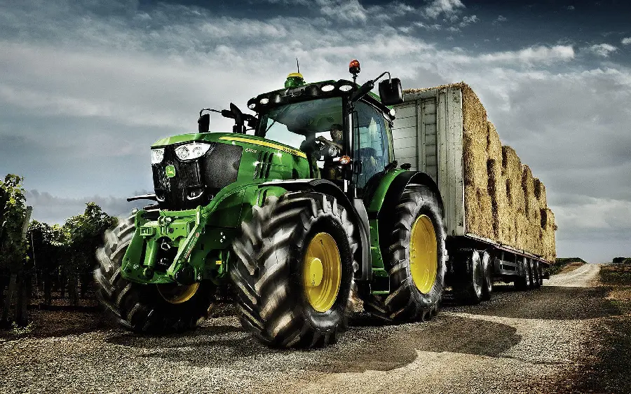 A spectacular wallpaper of a green and practical 2018 tractor