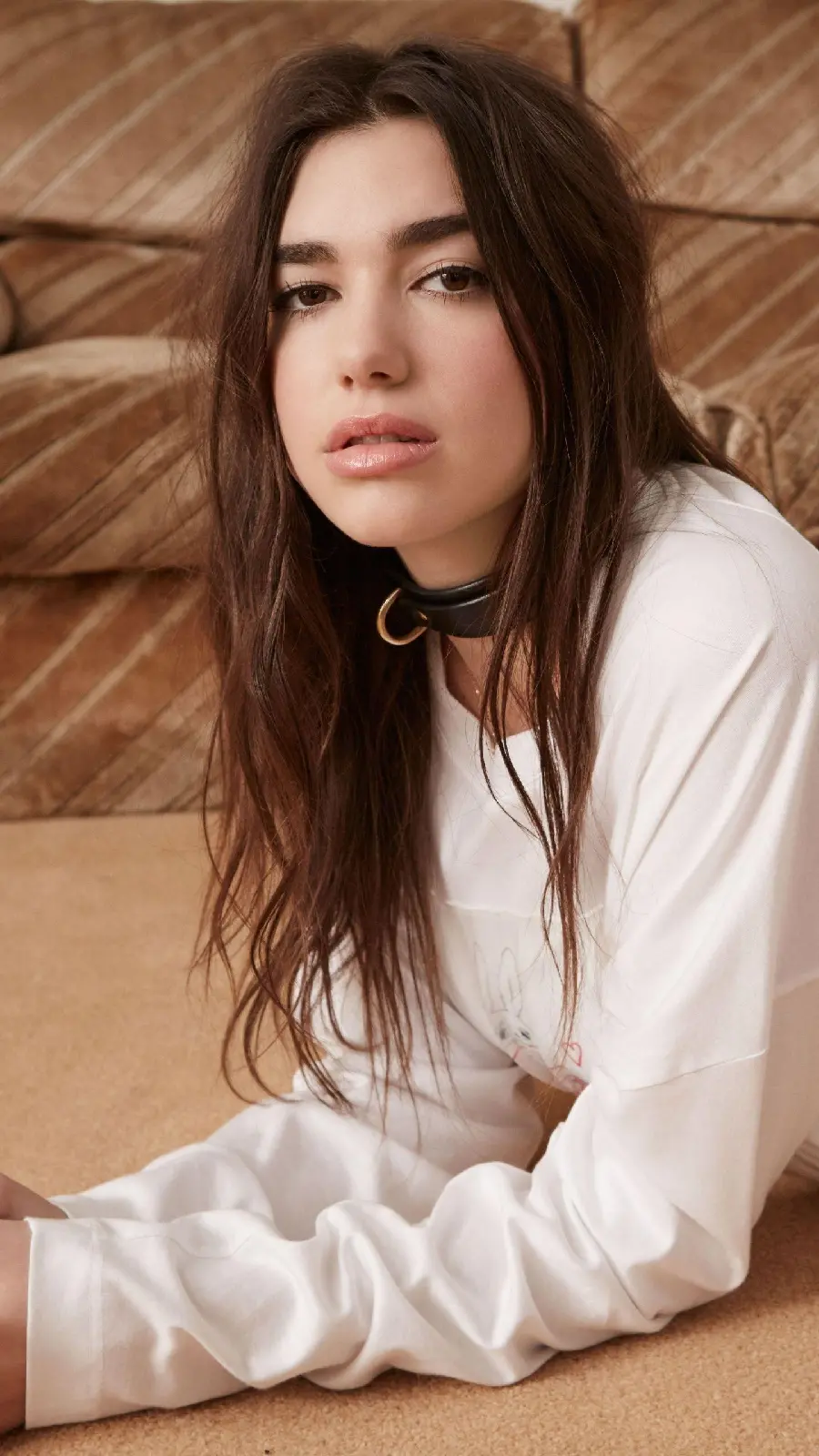 Background photo of the face Dua Lipa young singer with long hair 