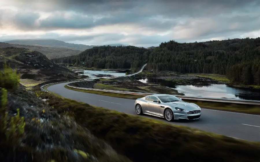 Spectacular wallpaper photo of a car moving on the road selected 2023