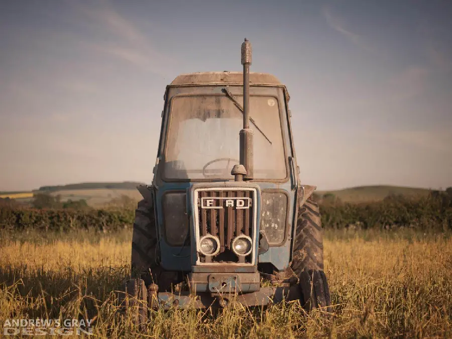 Interesting wallpaper of an old abandoned tractor