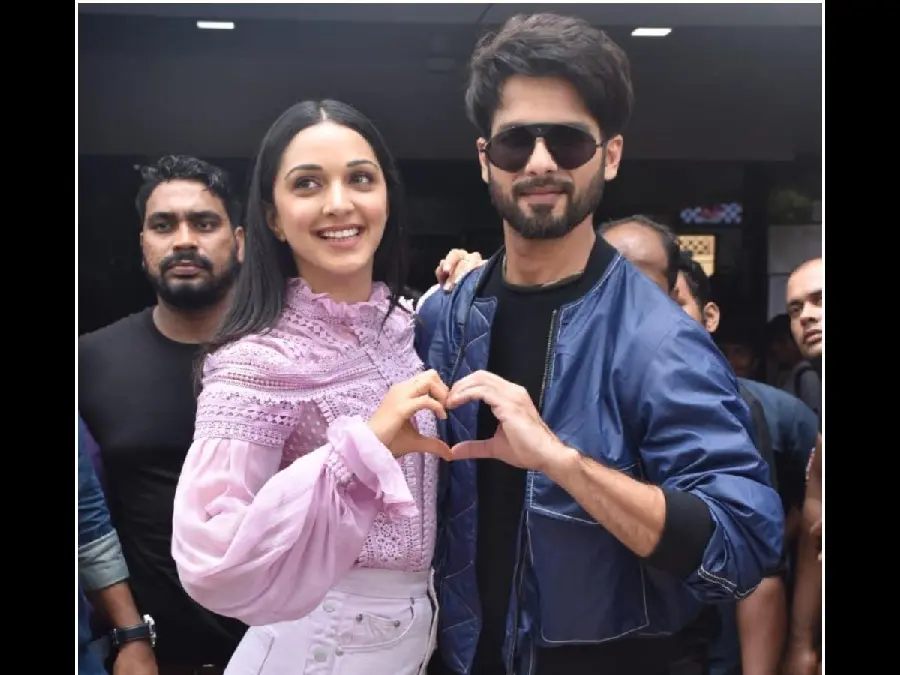 Stock image of Kiara Advani and her husband with a heart symbol