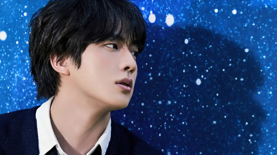 Picture of the charming and funny face of BTS member Jin