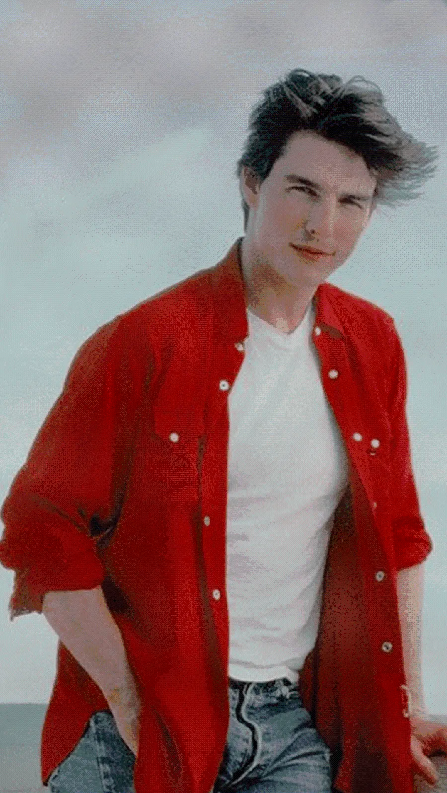 Wallpaper for the phone of Tom Cruise with a white T-shirt and red dress