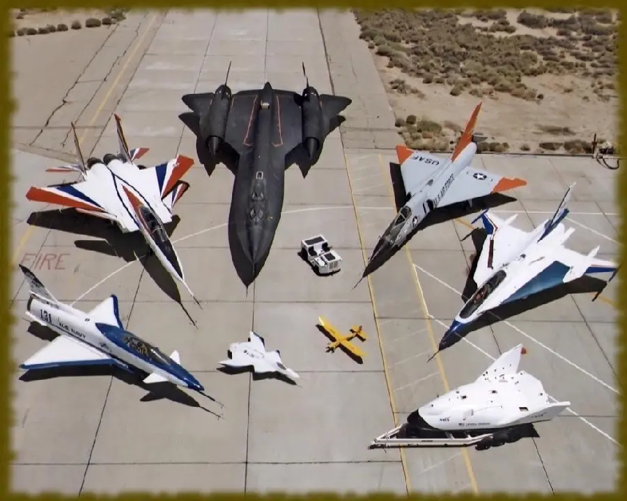 Photo of the Lockheed SR-71 Blackbird aircraft next to other military aircraft