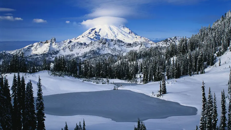 Winter background photo of mountainous nature surrounded by white snow