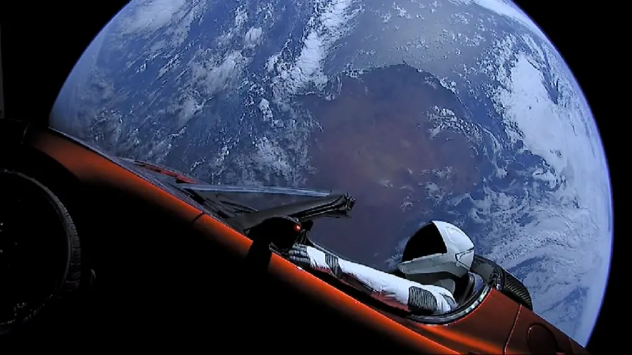Interesting space background photo with Tesla cars