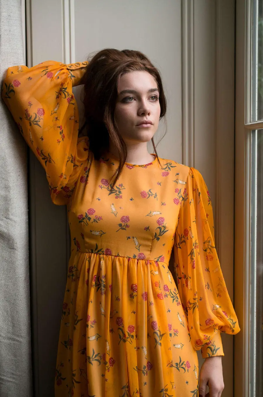 Florence Pugh wallpaper wearing an orange floral dress