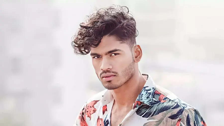 Stock photos of curly hairstyles for men and boys 1403 and 2024