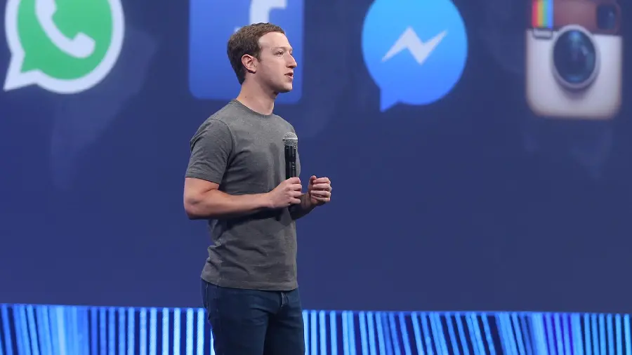 Image of Mark Zuckerberg with background of design of applications related to the meta system
