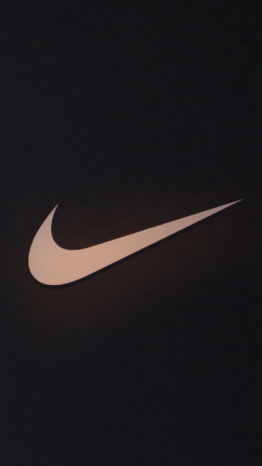 Nike Logo on Black Background Suitable for iPhone Samsung Xiaomi Wallpaper