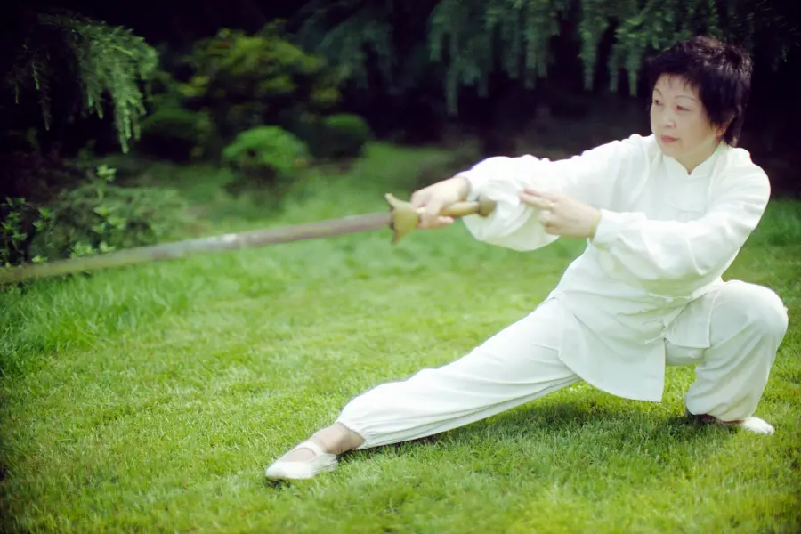 Photo of Chinese people and people of China exercising and fighting