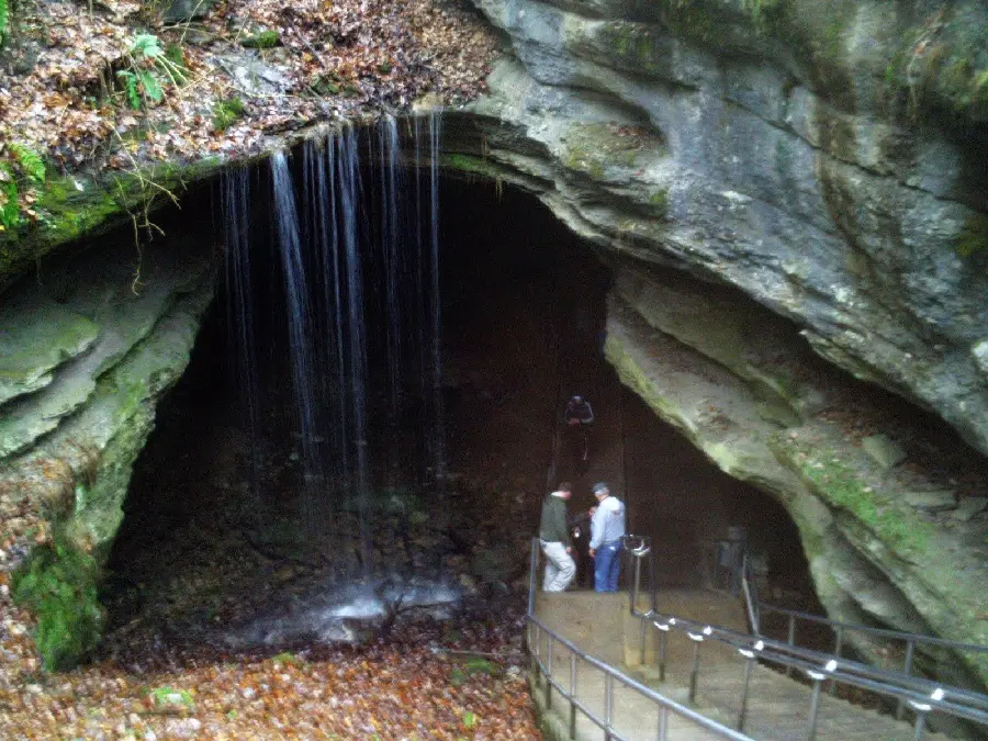 Photo of a natural spring and a large cave