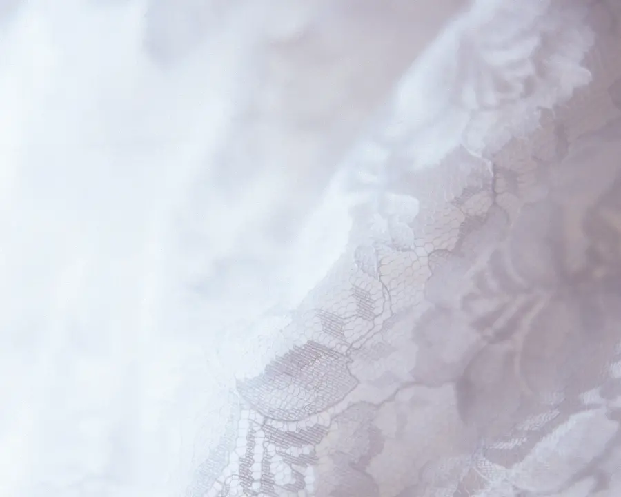 Photo of white floral guipure fabric material