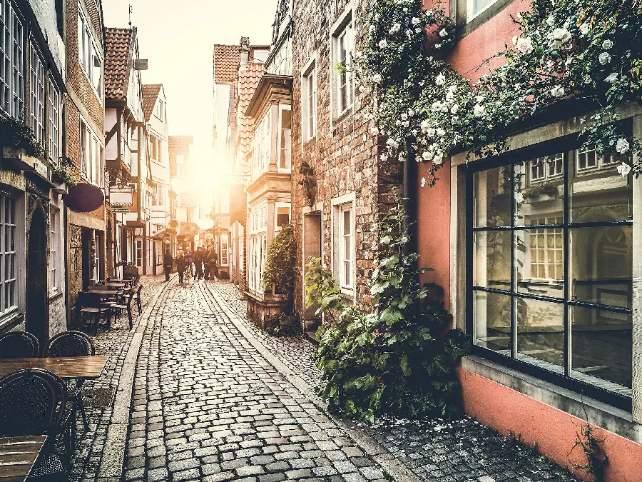 Cobblestone Streets with Small Shops in Italy Laptop Photo