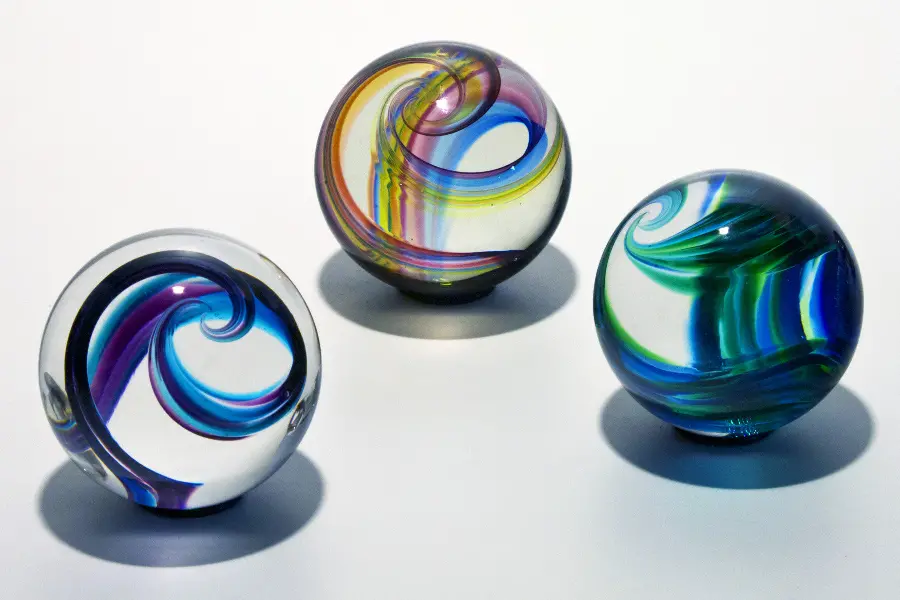 Glass marble on white background high quality