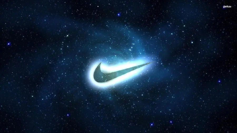 Bright and luminous Nike logo in the starry sky free download high quality