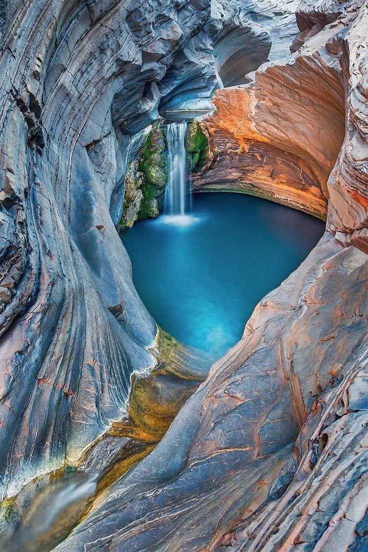 Picture of a natural lake between mountain rocks