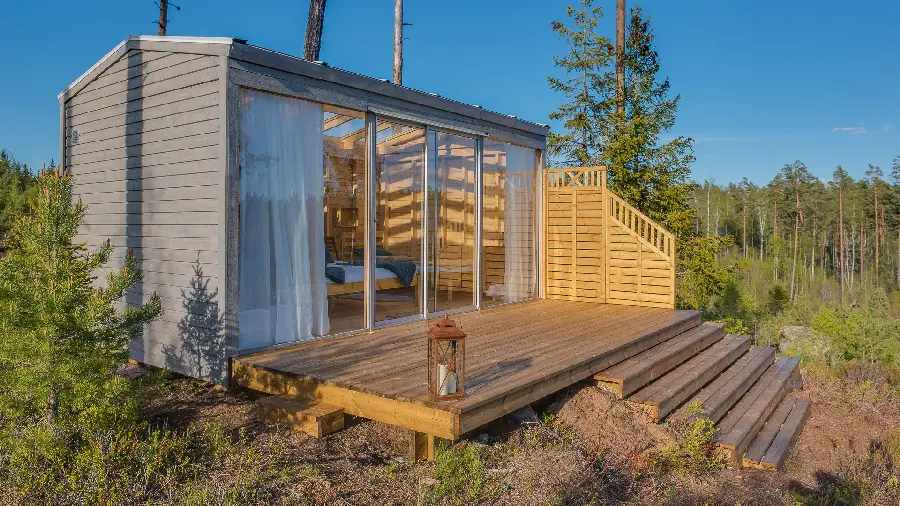 Small cottage with glass facade high quality image