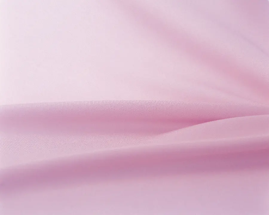 An image of a delicate and beautiful pale pink fabric texture