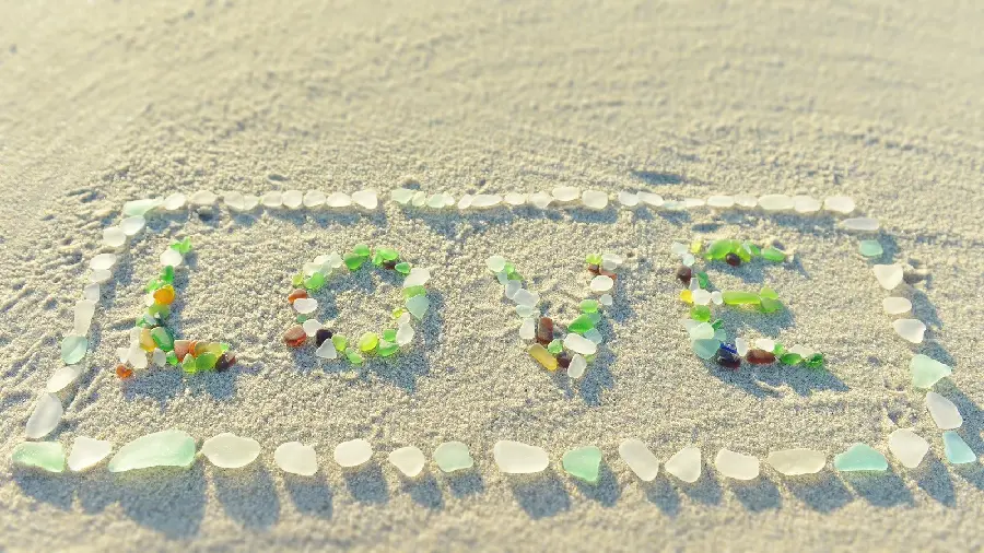 Clear Beach Glass Stones in the Shape of a Picture with the Word LOVE