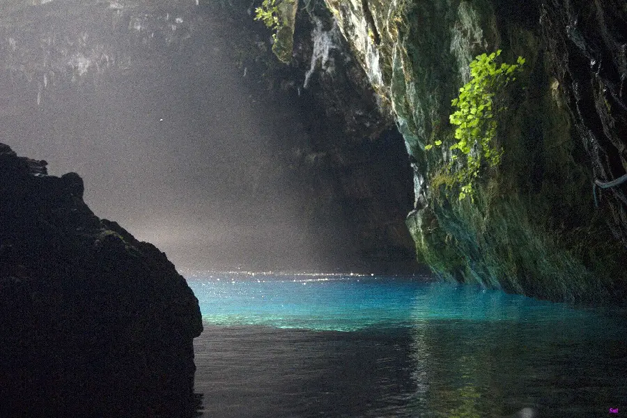 Photo of small lake and pristine natural caves