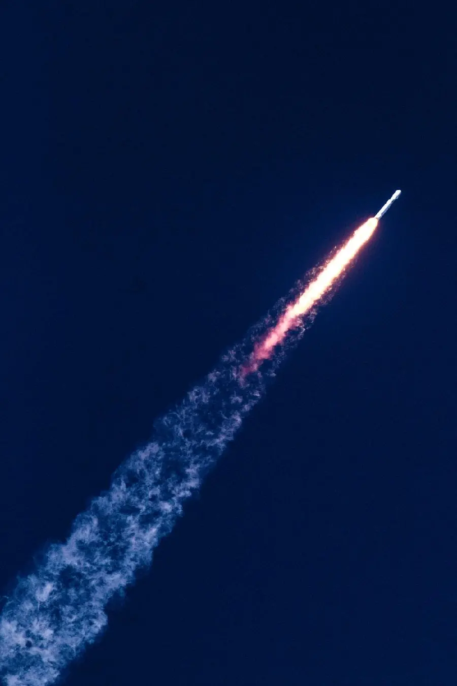 Image of Rocket Launching into Space and Satellite Carrier for Aerospace Missions