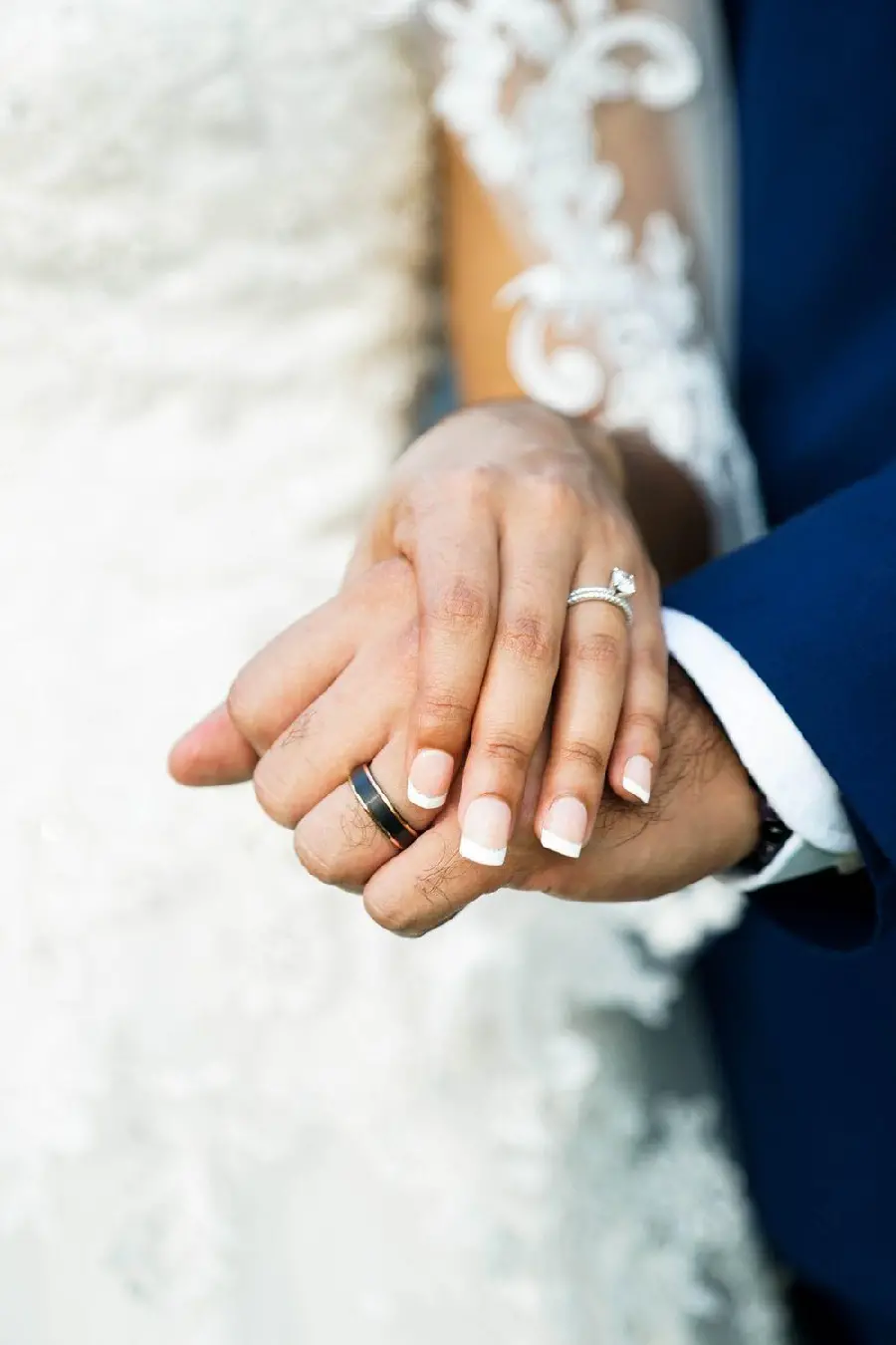 Hands of the bride and groom in high quality photography