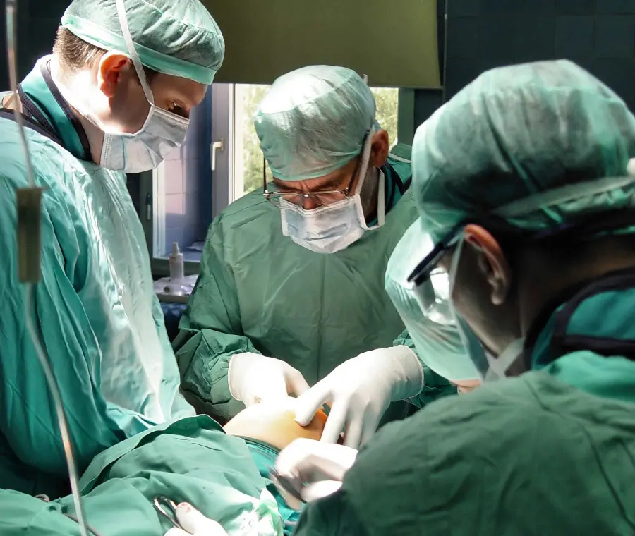 Photo of medical team of surgeon in operating room