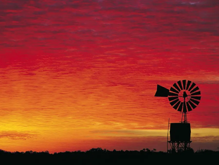 Orange sky at sunset and Australian farm wallpaper