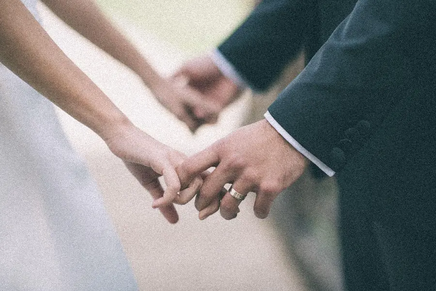 Wedding hands holding hands of bride and groom for profile picture