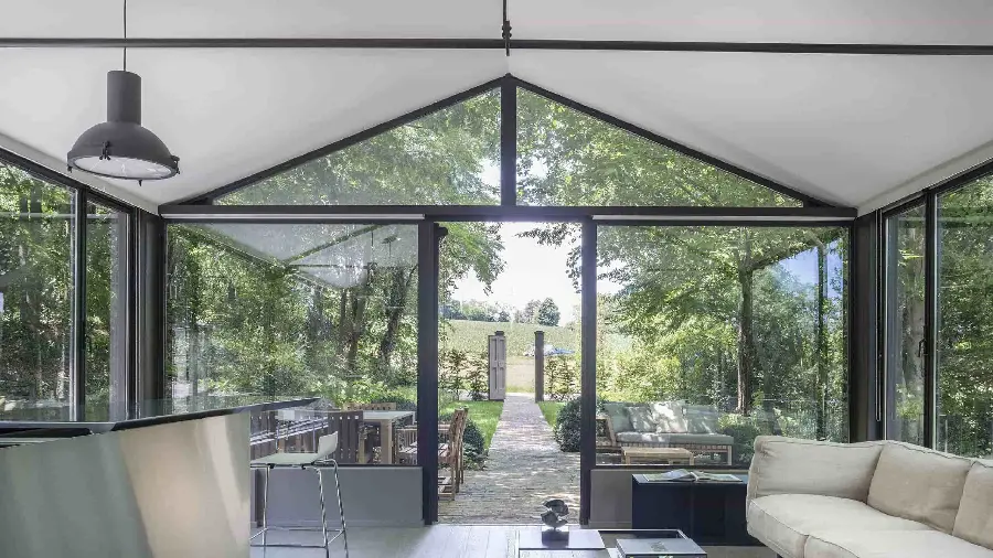 Glass house interior to exterior