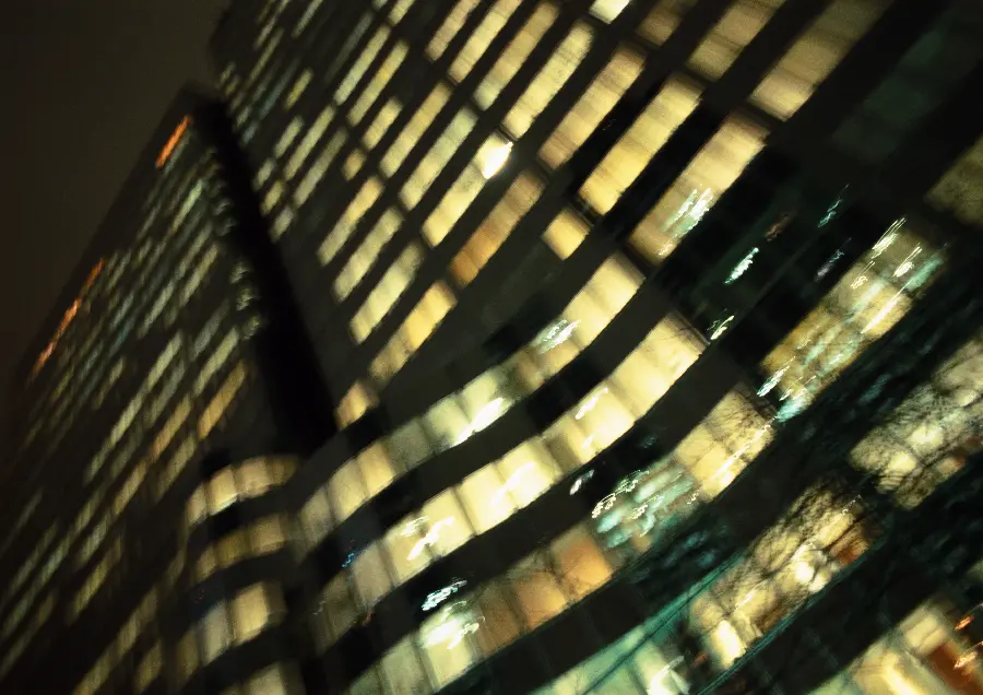 Photo of commercial office building at night