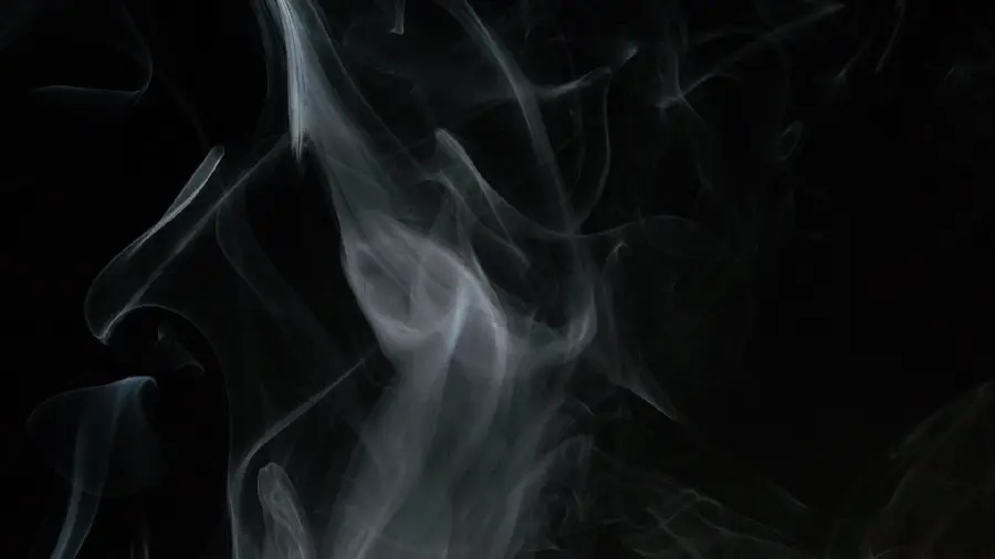Black and white background with cigarette smoke design