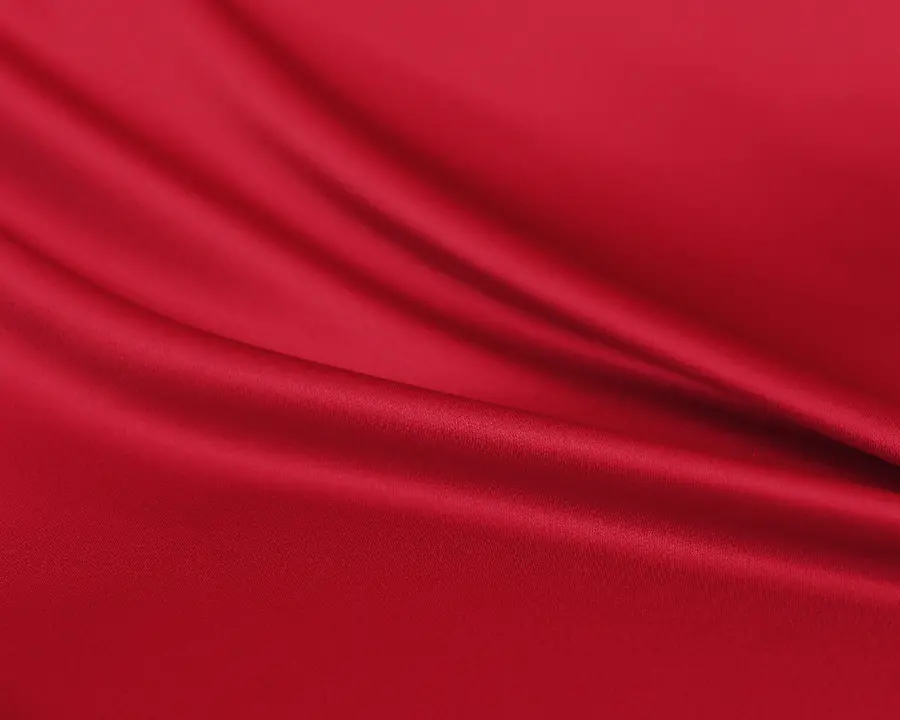 Texture image of fabric and fabric material in shiny red