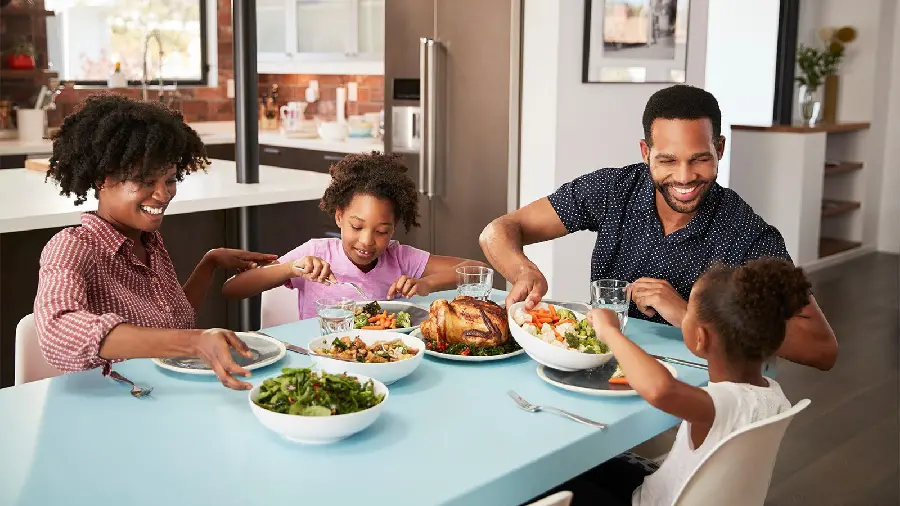 Family and dinner table photo