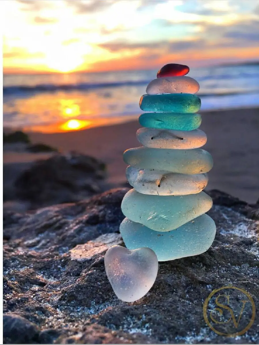 Transparent polished stones by the sea glass beach