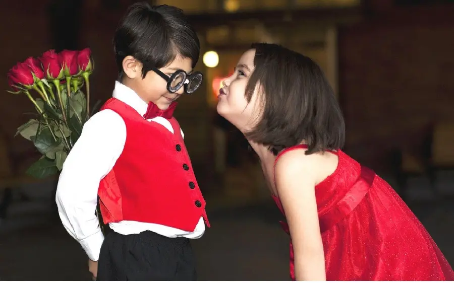 Cute baby girl and boy photo in red dress