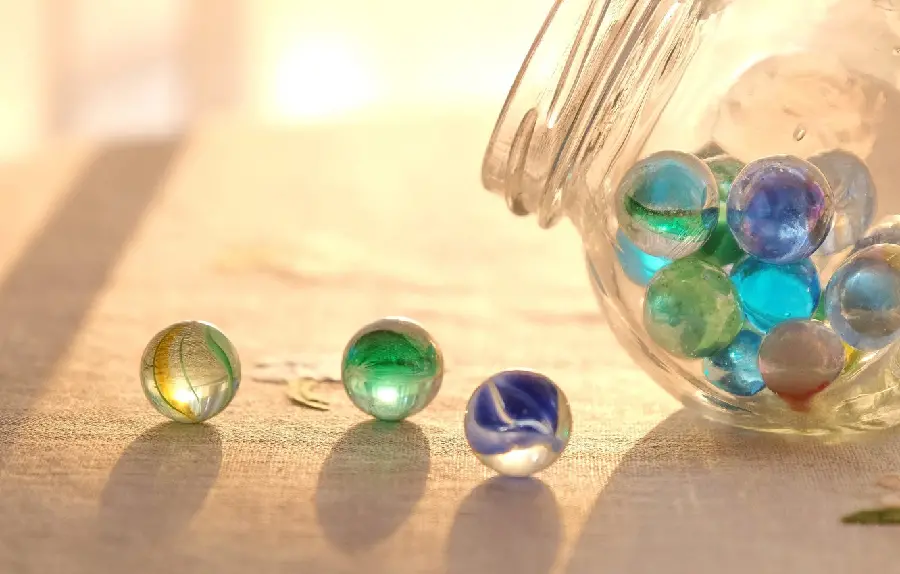 Photo of Children's games with glass marbles
