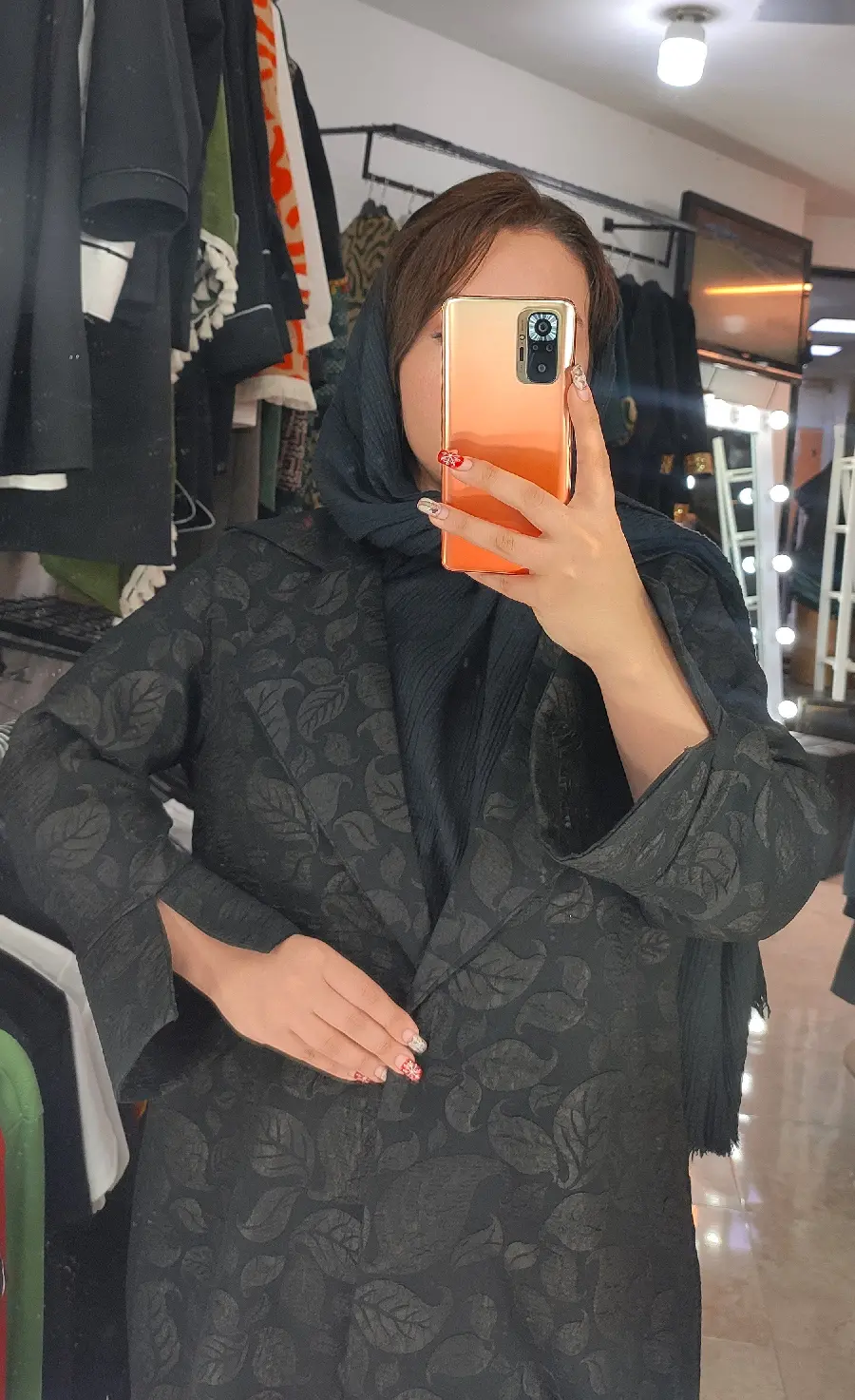 Photo of a long black coat