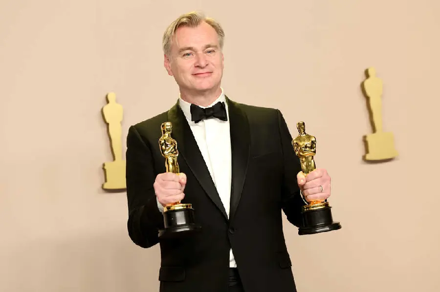 Photo of Christopher Nolan winning the Oscars 2024