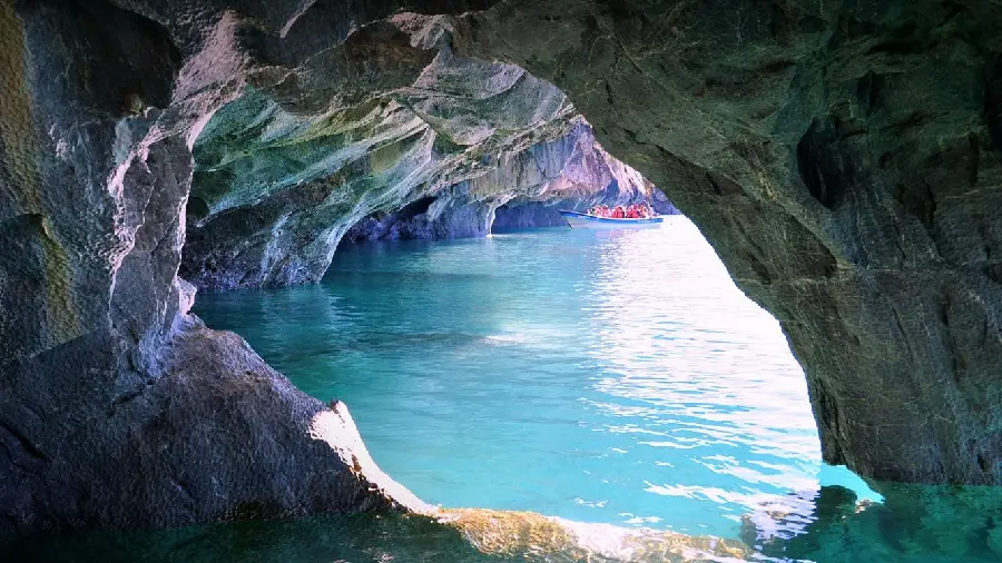 Natural cave lake with clear water