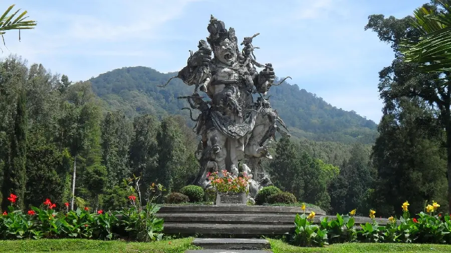 Photo of a large stone statue in the temples of Bali, Indonesia