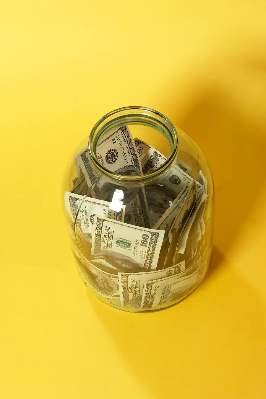 US Dollar Bills in a Jar
