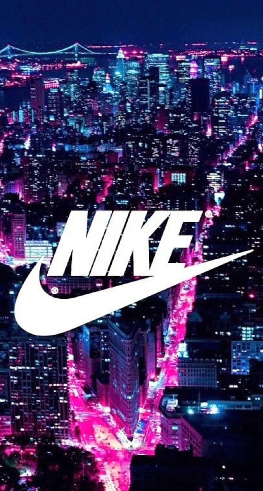 Nike Logo On Orange City Light Background For Laptop Wallpaper