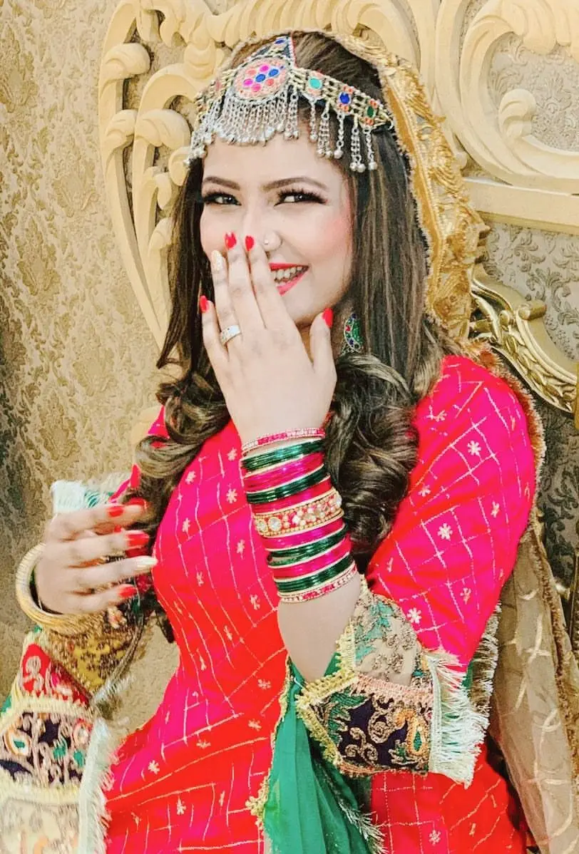 Photo of an Afghan girl in a local dress
